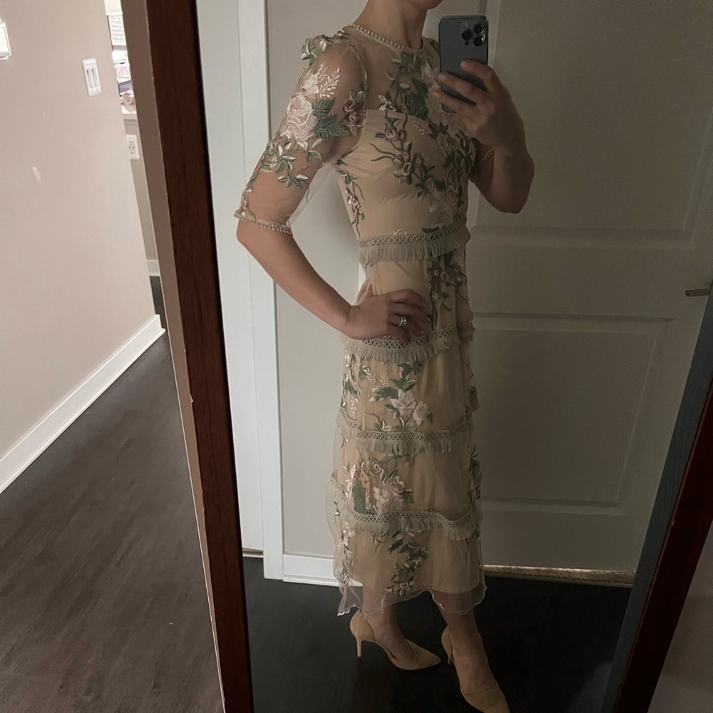 Darling beige dress with beautiful embroidered detail